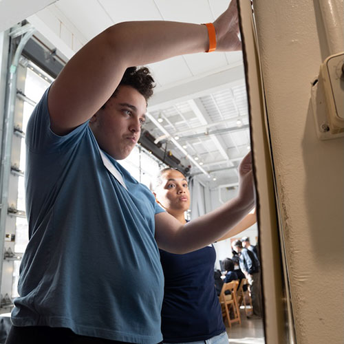 A student building a prototype at FastForge