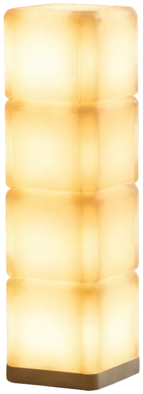 Kyub glowing cube lights stacked on their charging dock